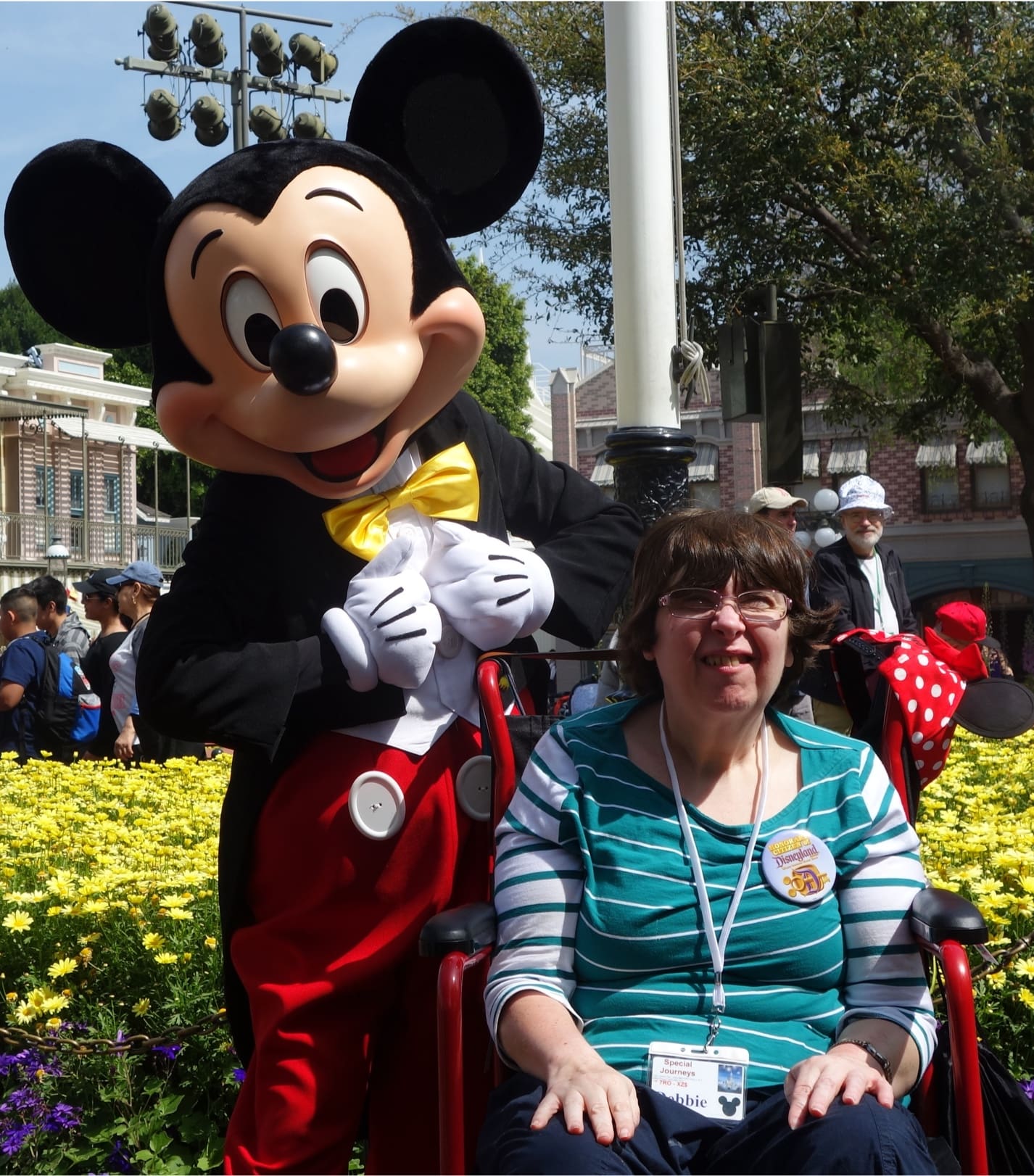 woman posing Mickey Mouse | Special Journeys | Vacations for People with Disabilities