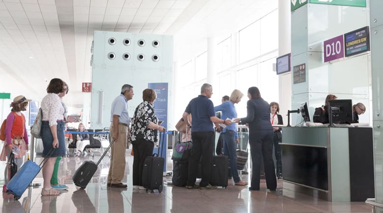 Travelers are airport boarding gate