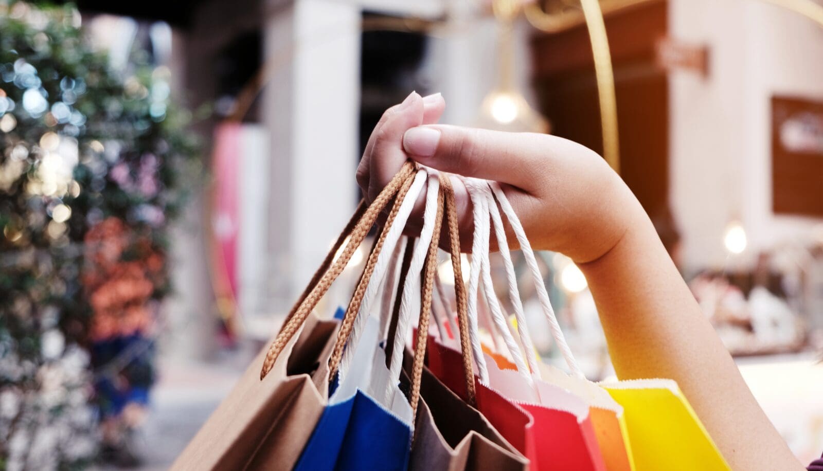 Girl holding sale shopping bags